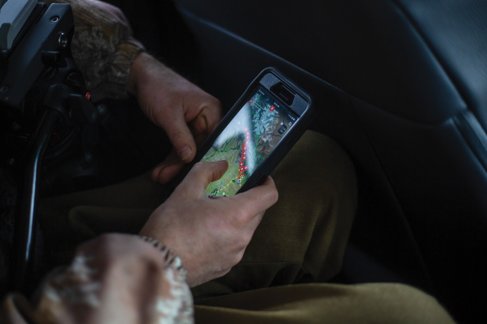 Greg Nickerson, a staff writer and filmmaker for the Wyoming Migration Initiative, checks Deer 255’s progress as she migrates south along the Wind River Range toward the Prospect Mountains in late November.