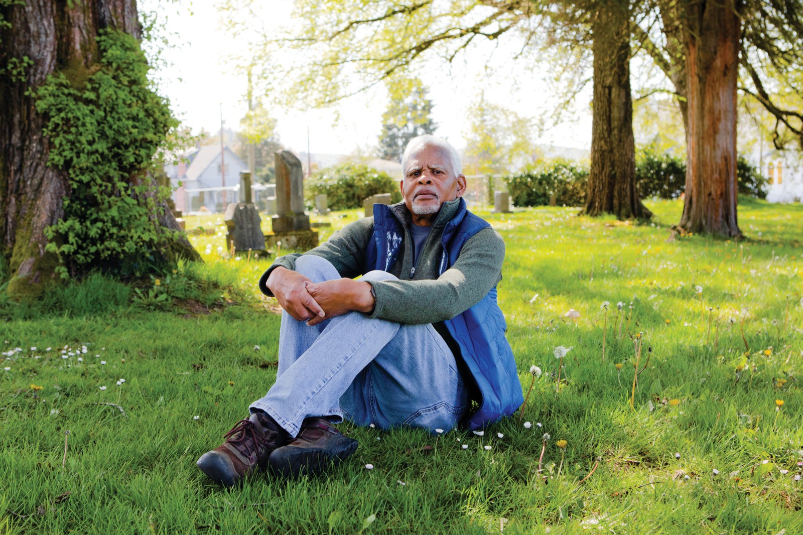 Jim McCully at Centralia founder George Washington’s grave, at Washington Law Cemetery.