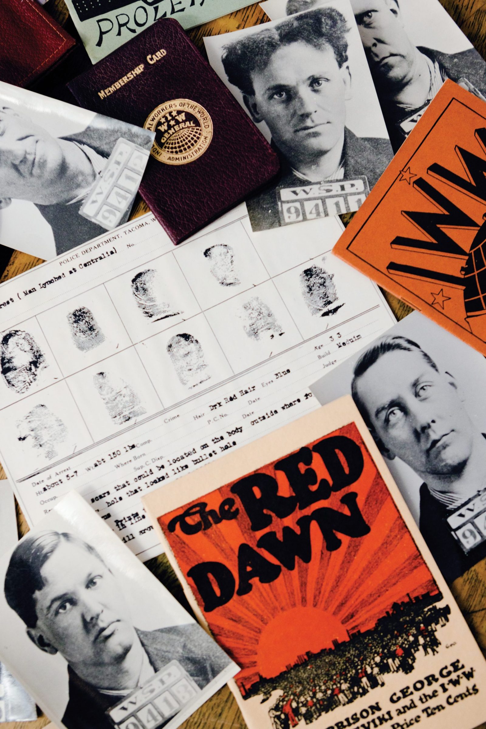 Artifacts at the Lewis County Historical Museum in Chehalis, Washington, including fingerprints belonging to Wesley Everest, mugshots of the IWW members who were arrested and put on trial following the shooting incident, and other IWW materials from the period.
