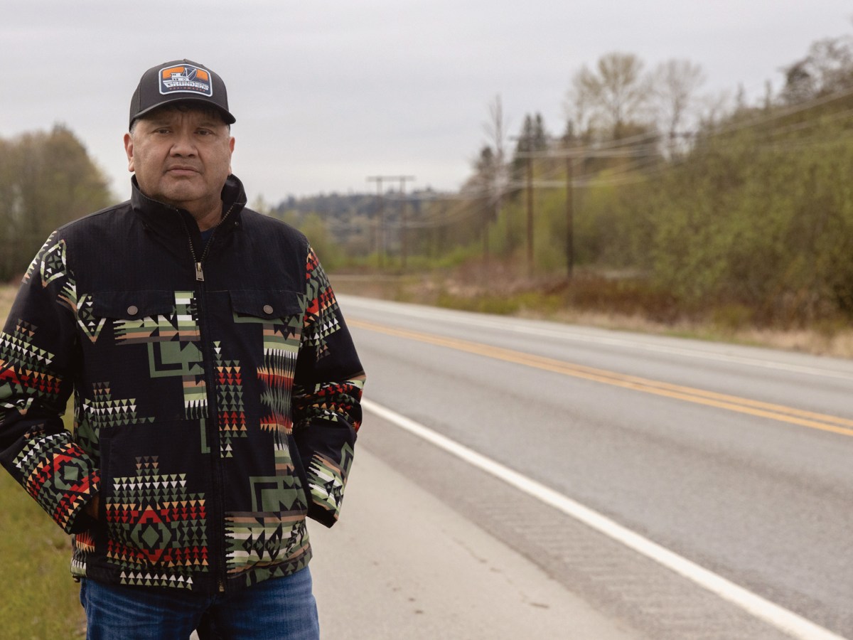 Scott Schuyler, a member of the Upper Skagit Indian Tribe and its natural resources and cultural policy representative, stands by the site of the future wildlife crossing in Skagit Valley, Washington.