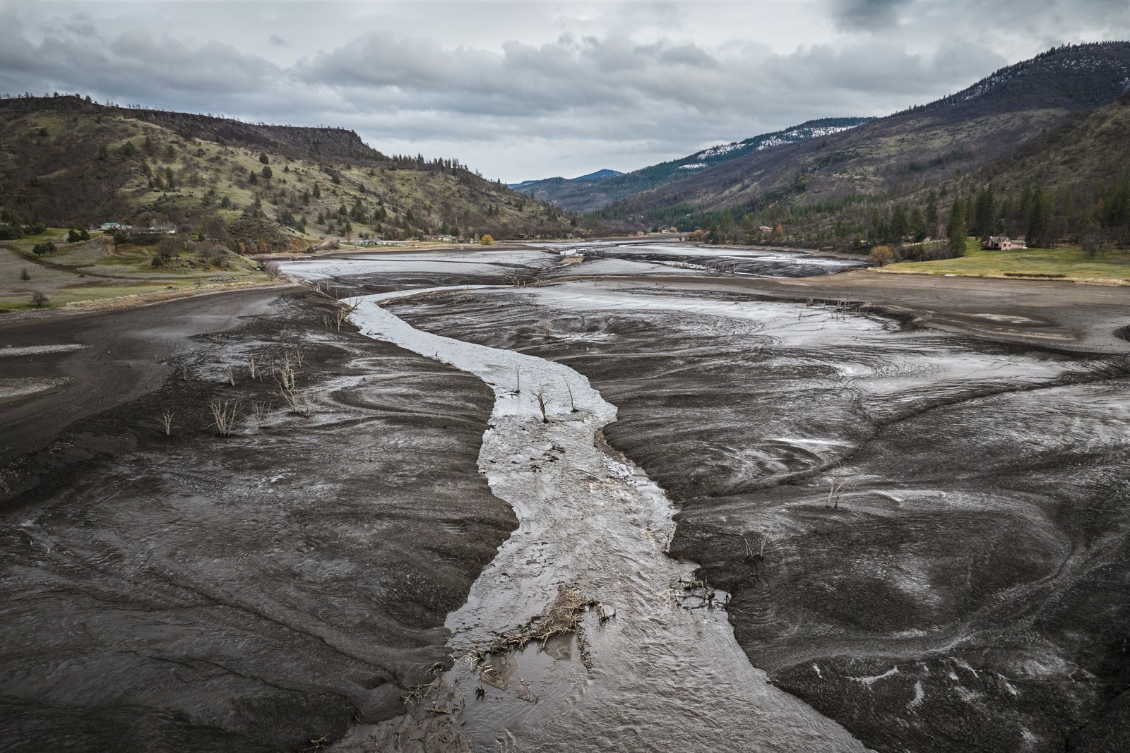 The Klamath River’s new main channel flows through the landscape that emerged when the Copco Reservoir was drawn down. The area was submerged for more than 100 years behind Copco Number 1 Dam. 